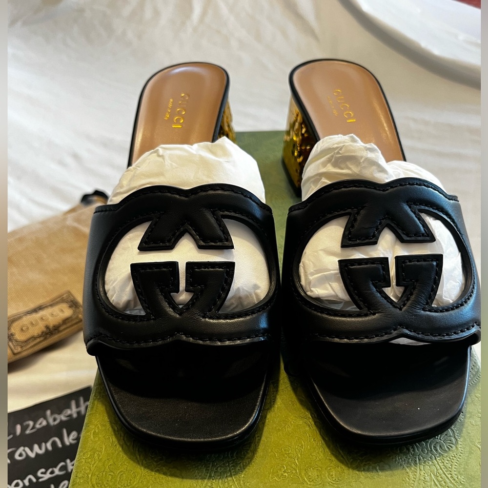 Gucci women’s Interlocking cutout G cosmos calfskin gold heel NWT box, dusters